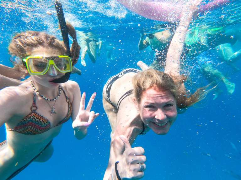 Snorkelling in clear water on a Barbados trip with Eclipse Fishing Charters