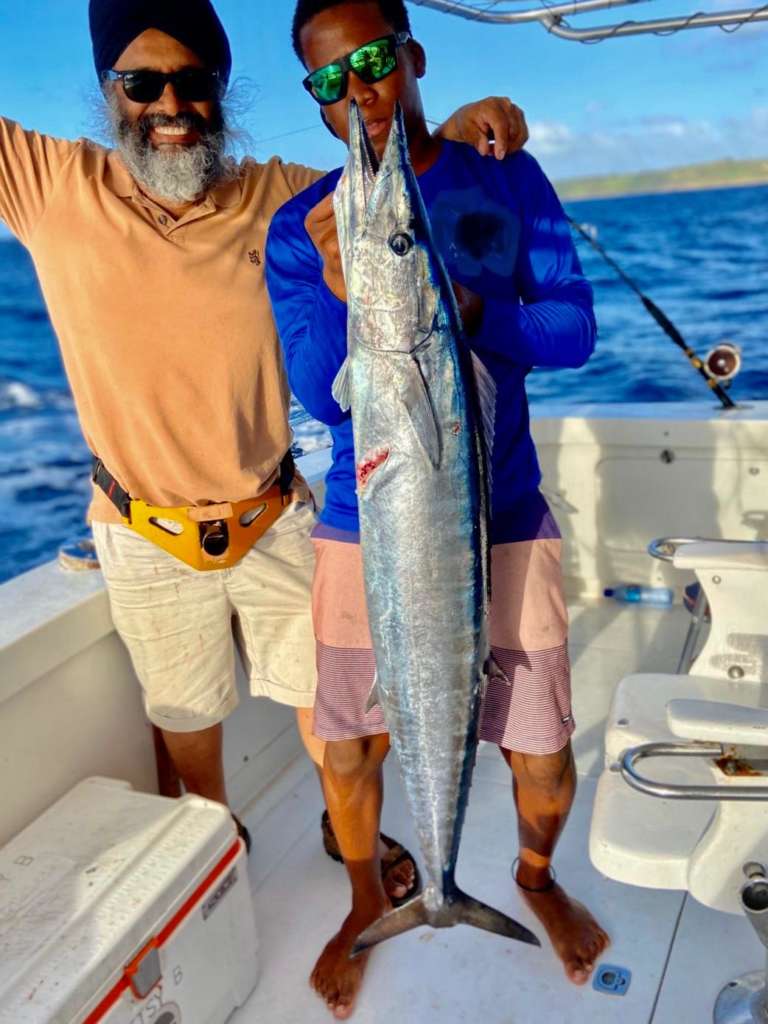 Angler hooked up on an Eclipse fishing charter in Barbados